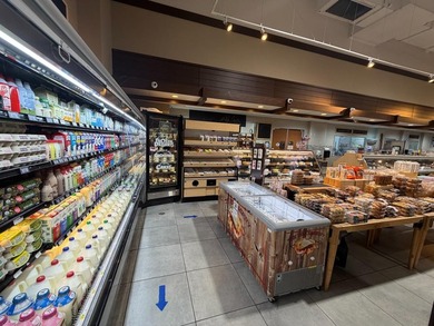 This strategically located grocery store presents an outstanding - photo 11