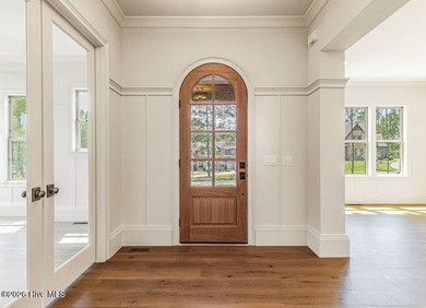 This grand home offers an impressive layout filled with style - photo 15