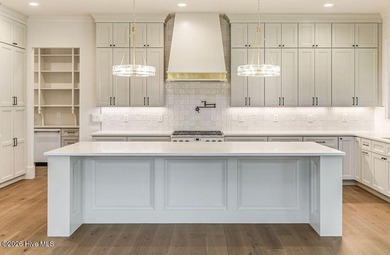 This grand home offers an impressive layout filled with style - photo 18