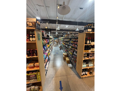 This strategically located grocery store presents an outstanding - photo 21