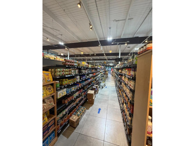 This strategically located grocery store presents an outstanding - photo 22