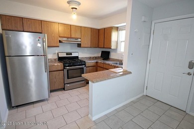 Excellent opportunity to own a 2-family semi-attached home in a - photo 23
