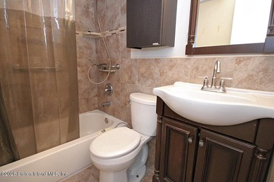 Excellent opportunity to own a 2-family semi-attached home in a - photo 26