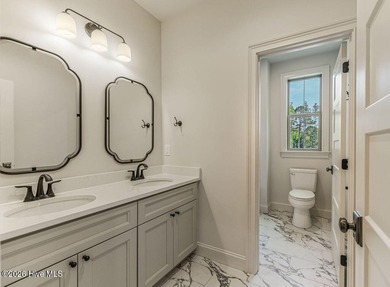 This grand home offers an impressive layout filled with style - photo 54