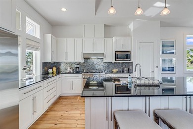 Such a STUNNING COAST CONDO! Turnkey with elevator, boat lift - photo 11