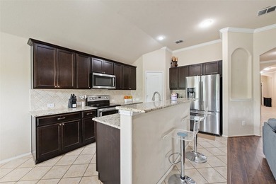 Beautiful 2 story, 4 bedroom home with a study in booming Aubrey - photo 11