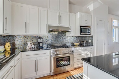 Such a STUNNING COAST CONDO! Turnkey with elevator, boat lift - photo 12