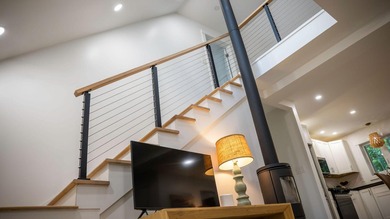 Modern efficiency meets relaxed coastal living at 98 River Road - photo 21