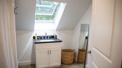 Modern efficiency meets relaxed coastal living at 98 River Road - photo 23