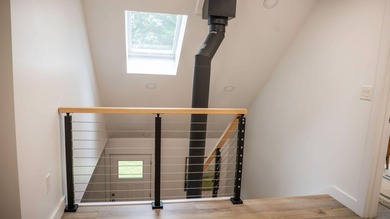 Modern efficiency meets relaxed coastal living at 98 River Road - photo 29