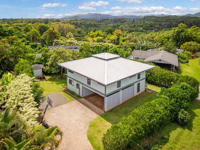 Nestled in the heart of Kilauea, this thoughtfully designed and - photo 1