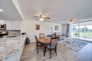 Nestled in a vibrant 55+ community, this completely remodeled in - photo 11