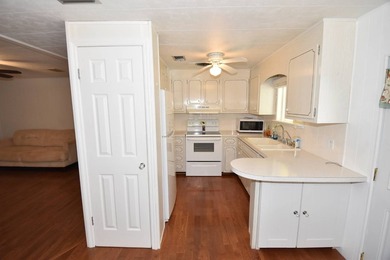 Welcome to this well-maintained mobile home located in a - photo 8