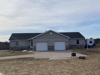 Lake Home For Sale in Benzonia, Michigan