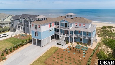 Welcome to this exceptional 12-bedroom, 10.5-bath custom-built