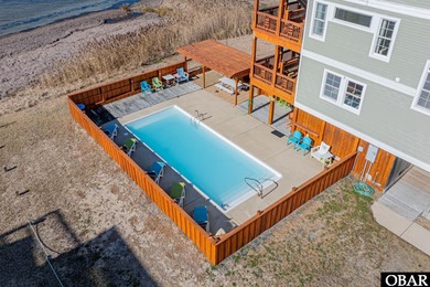 Sounds Great lives up to its name. This soundfront home in