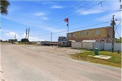 Rare Commercial MARINE-ZONED property along the Gulf Beaches of - photo 8