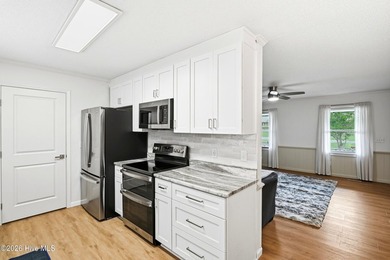 Welcome home to this beautifully updated property situated on a - photo 13