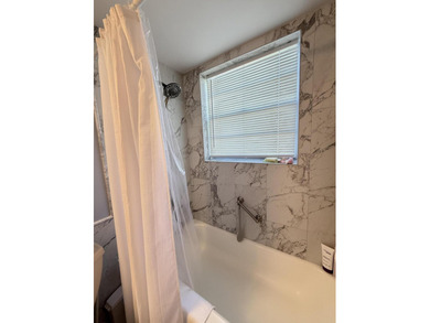 Beautifully updated furnished 1 bedroom, 1.5 bath condo located - photo 13