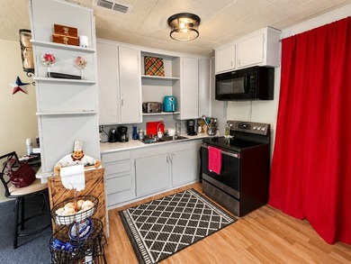 Welcome to this charming 2-bedroom, 1-bath home situated on a - photo 5