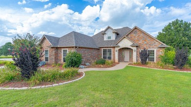 Beautifully maintained brick home with cut stone accents. Easy - photo 2