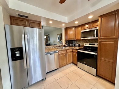Welcome to this stunning turnkey 2 bed 2 bath property located - photo 2