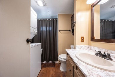 Charming 2-Bedroom Mobile Home in River Woods Welcome to this - photo 17