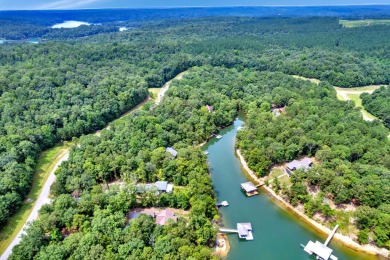 A wooded 1.45 acre lot with 79 feet of waterfront in Smith - Lake Lot For Sale in Double Springs, Alabama