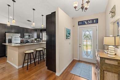 Situated on a spacious corner lot in Stuart's desirable Rocky - photo 3