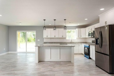 Welcome to 388 Edgewater Ave in Dayton, TN--a spacious and - photo 3