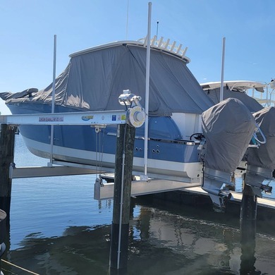 HUGE PRICE IMPROVEMENT! 40FT BOAT SLIP INCLUDED w/NEW 20,000 lb - photo 2