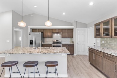 Welcome home to this charming 3-bedroom, 2-bath residence on a - photo 2