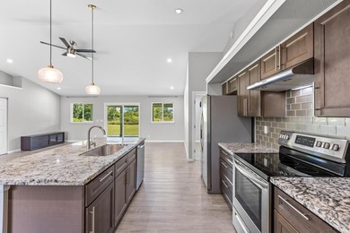 Welcome home to this charming 3-bedroom, 2-bath residence on a - photo 3
