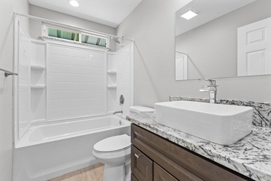Welcome home to this charming 3-bedroom, 2-bath residence on a - photo 10