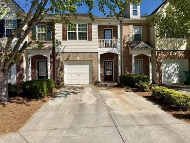 Spacious 3-bedroom, 2- and 1/2bath townhome located in a gated - photo 1