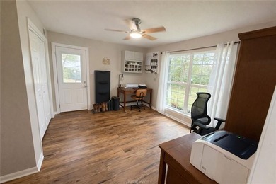 Set on nearly an acre of land, this one-of-a-kind property - photo 12