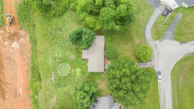 Mature trees, solid surface flooring throughout, wood-burning - photo 21
