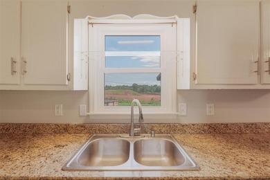 Mature trees, solid surface flooring throughout, wood-burning - photo 30