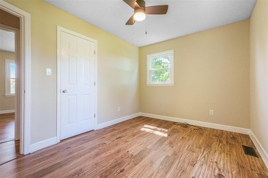 Mature trees, solid surface flooring throughout, wood-burning - photo 43