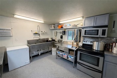 Set on nearly an acre of land, this one-of-a-kind property - photo 44