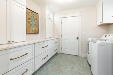 Welcome to 228 Matties Way, an exquisite lakefront retreat that - photo 20