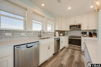 Built in 2021 and impeccably maintained, this luxury soundfront