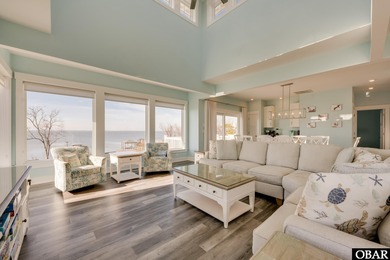 Built in 2021 and impeccably maintained, this luxury soundfront