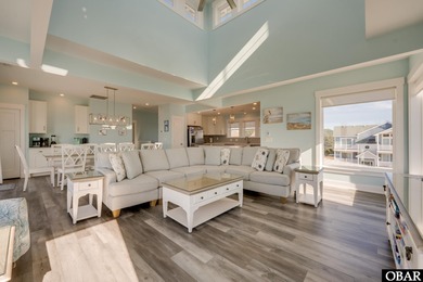 Built in 2021 and impeccably maintained, this luxury soundfront