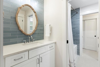 Welcome to 228 Matties Way, an exquisite lakefront retreat that - photo 35