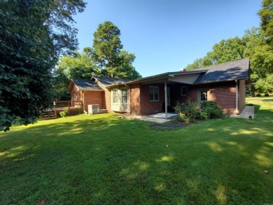 Welcome home to this charming brick residence nestled in Piggott