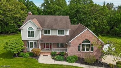 Peace and serenity surround you in this spectacular custom-built - photo 1