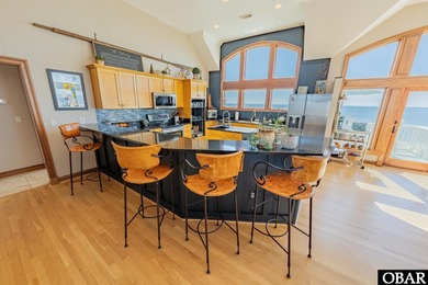 Located in the exclusive Hatteras Landing subdivision at the