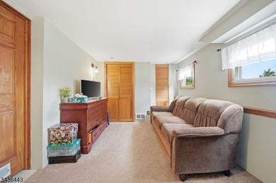 Perched on a corner lot in Pinecliff Lake Community, this - photo 3