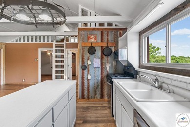 Experience the rustic charm of this log-sided home with stunning - photo 13